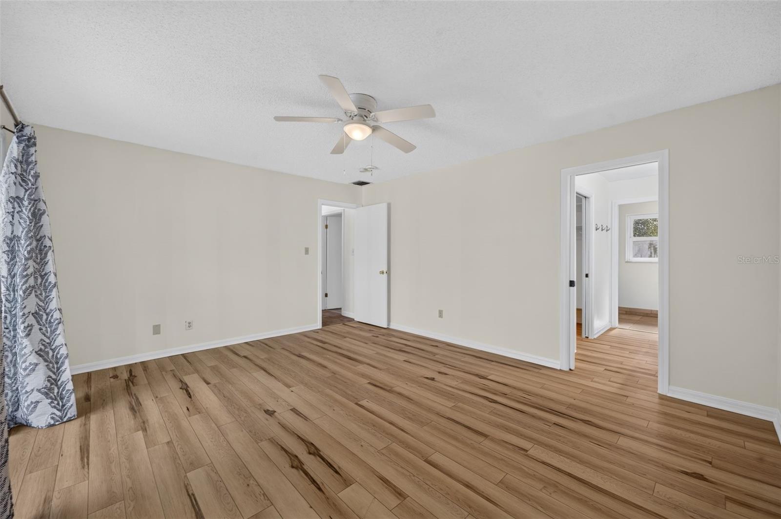 Primary with view of bath and closet