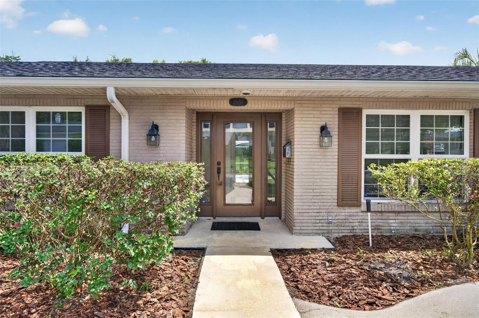 Landscape refresh and pressure washing make a difference