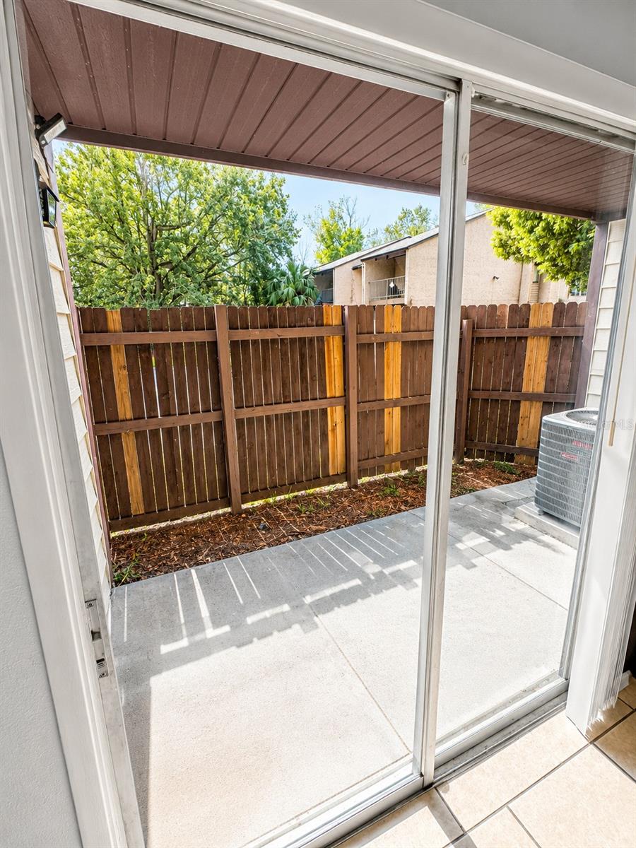 Fenced in back porch