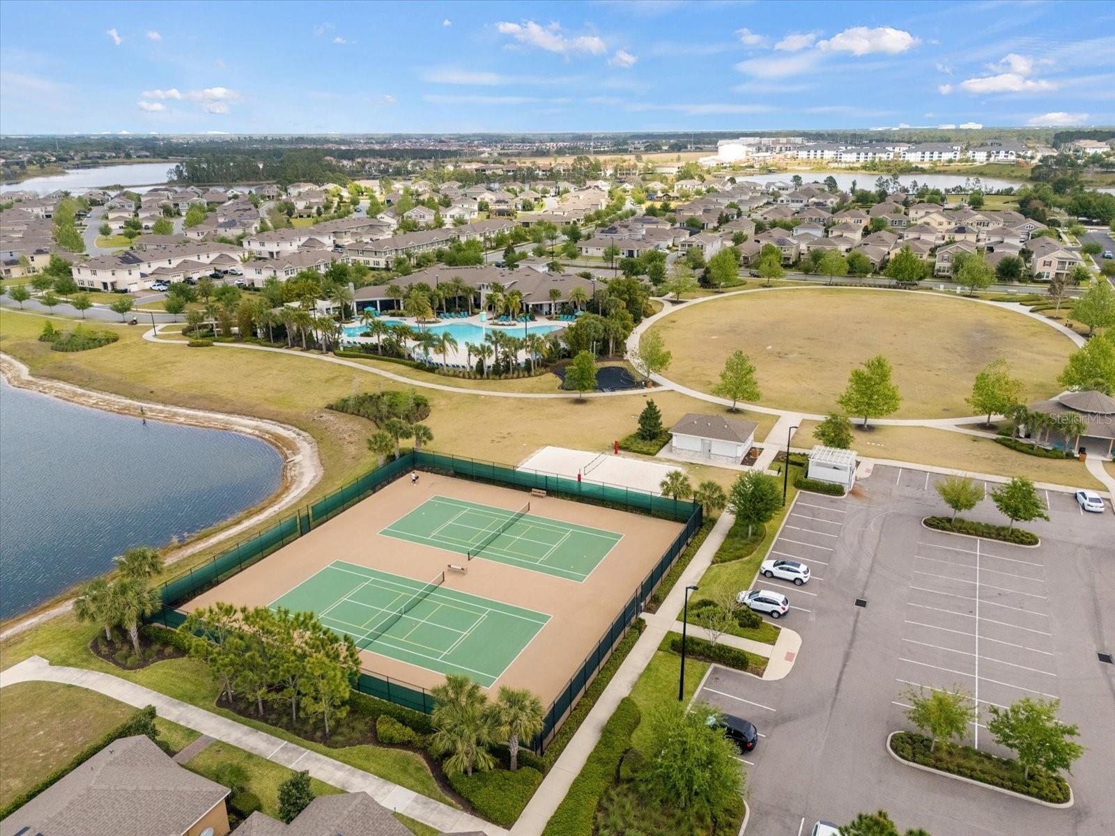 neighborhood tennis courts with lots of parking and bathrooms
