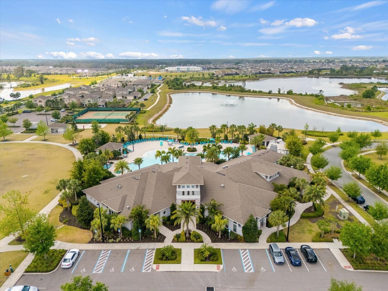 Neighborhood Large Clubhouse w/ large fitness center, tennis courts, huge pool, volleyball, sports field, playgrounds, etc.