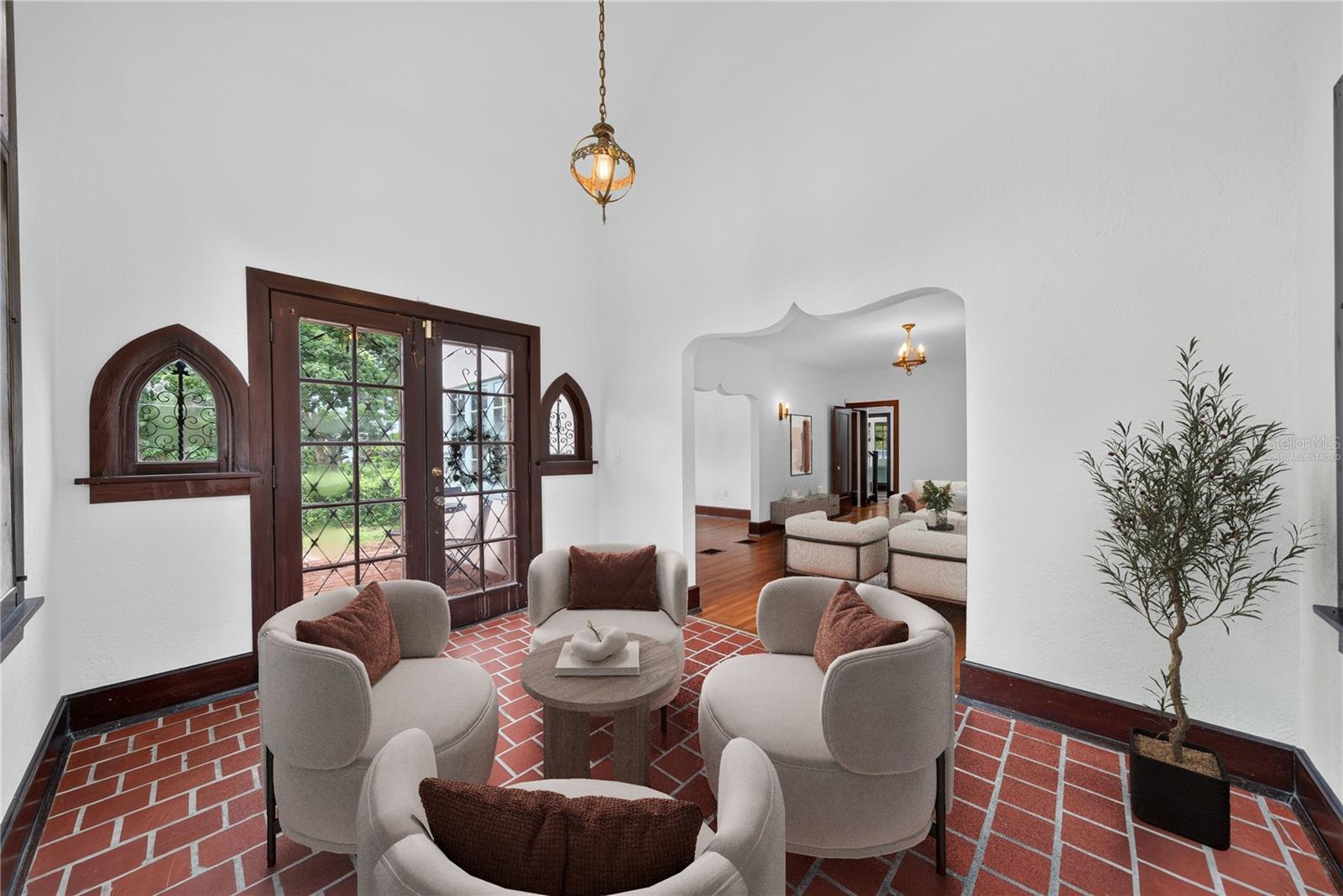 Virtually staged sunroom.