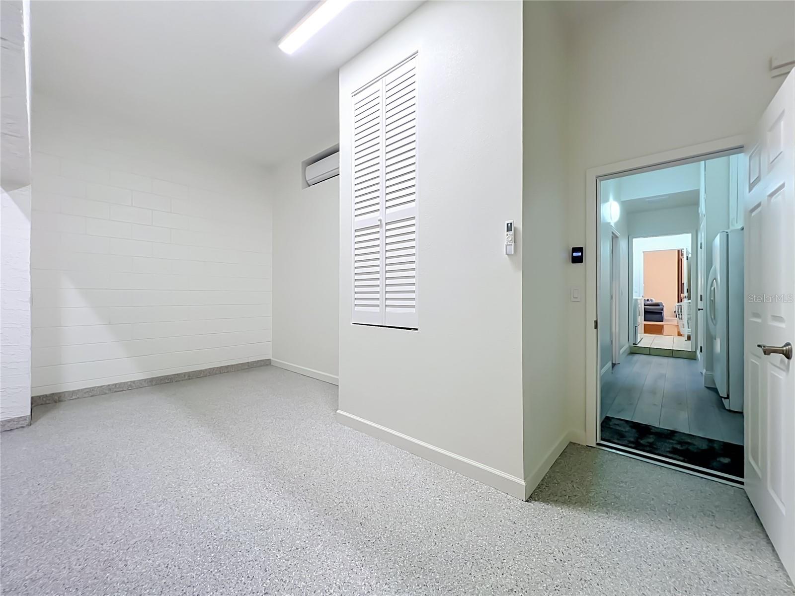 HAS A MINI SPLIT AC FOR GARAGE