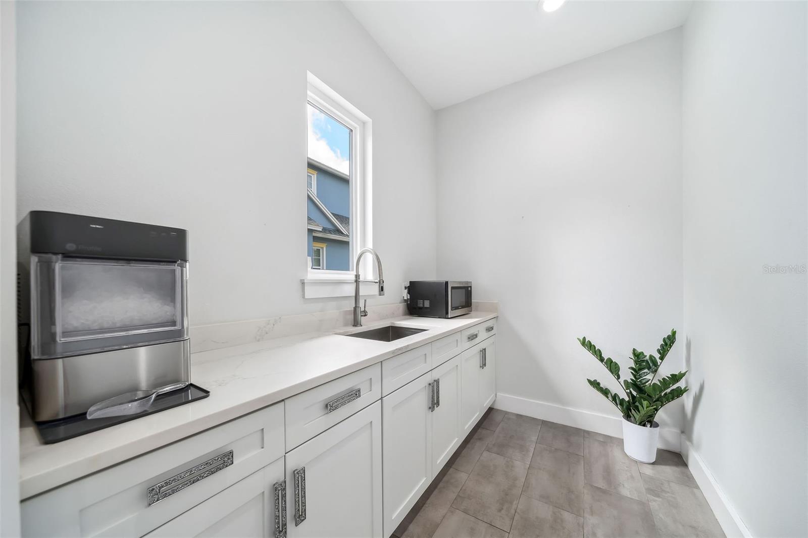 Butler's Pantry with Sink and Tons of Storage