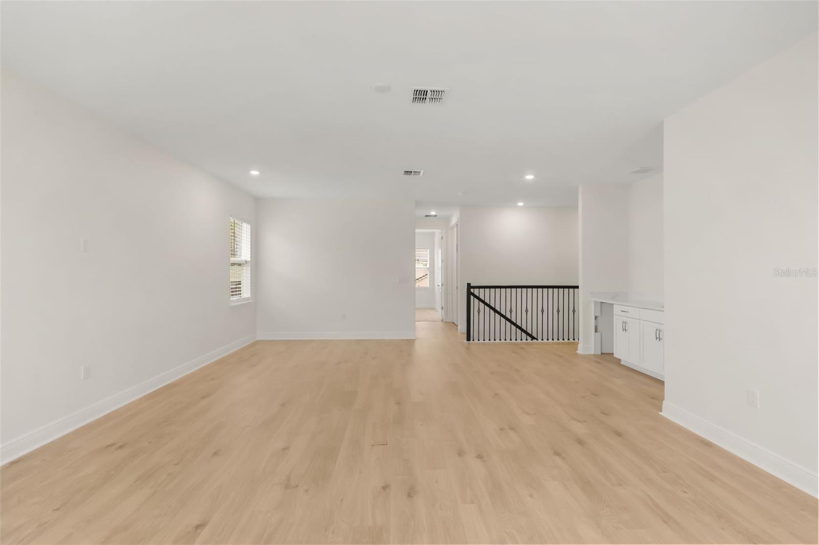 2nd floor loft with tons of space and a wet bar