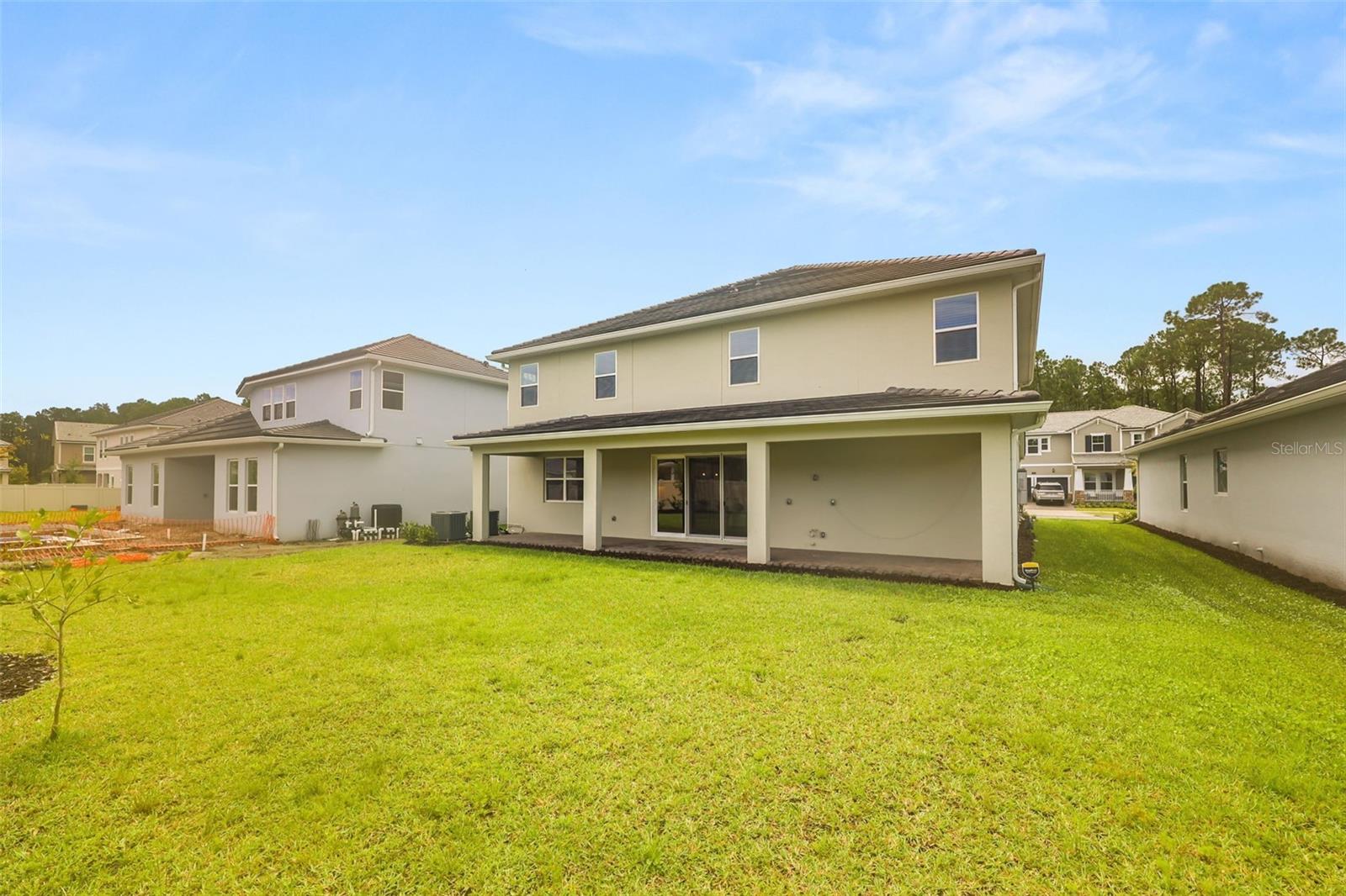 Large back yard with plenty of space for a pool