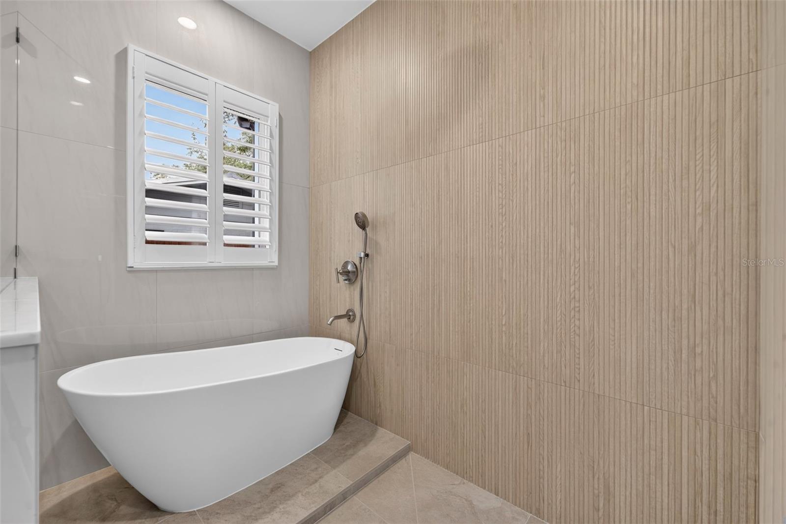 Walk-in shower with multiple showerheads & soaking tub