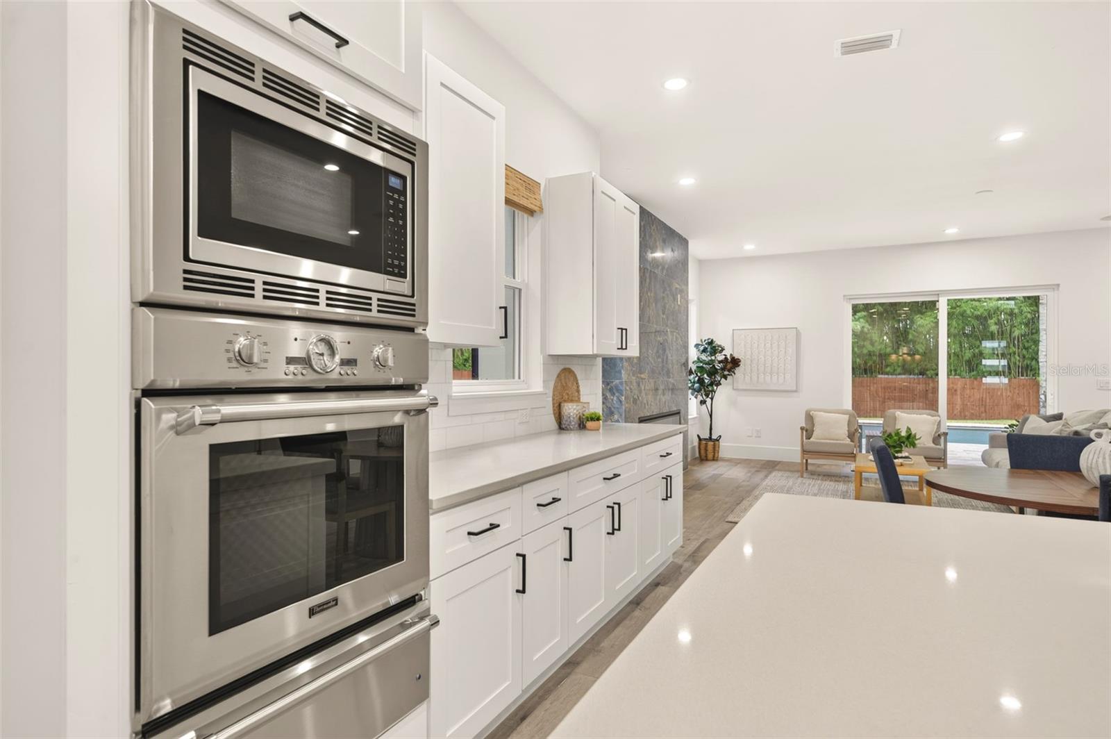 Built-in hybrid convection oven, microwave, & warming drawer