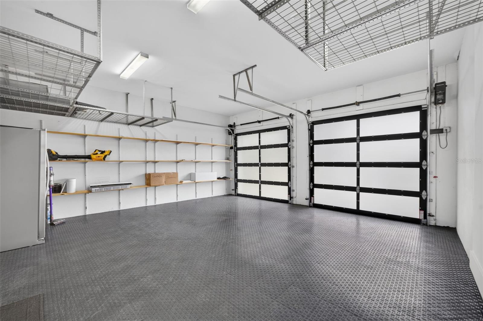 2-car garage with durable flooring & tons of storage