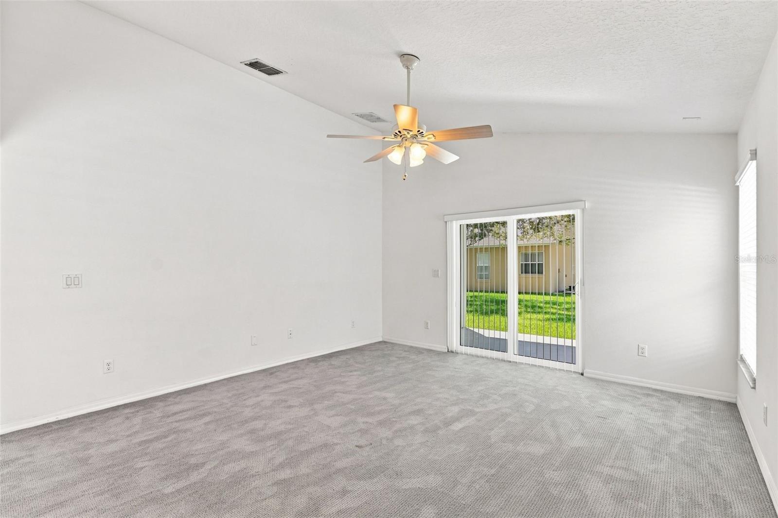 Spacious Living Room with Ceiling Fan