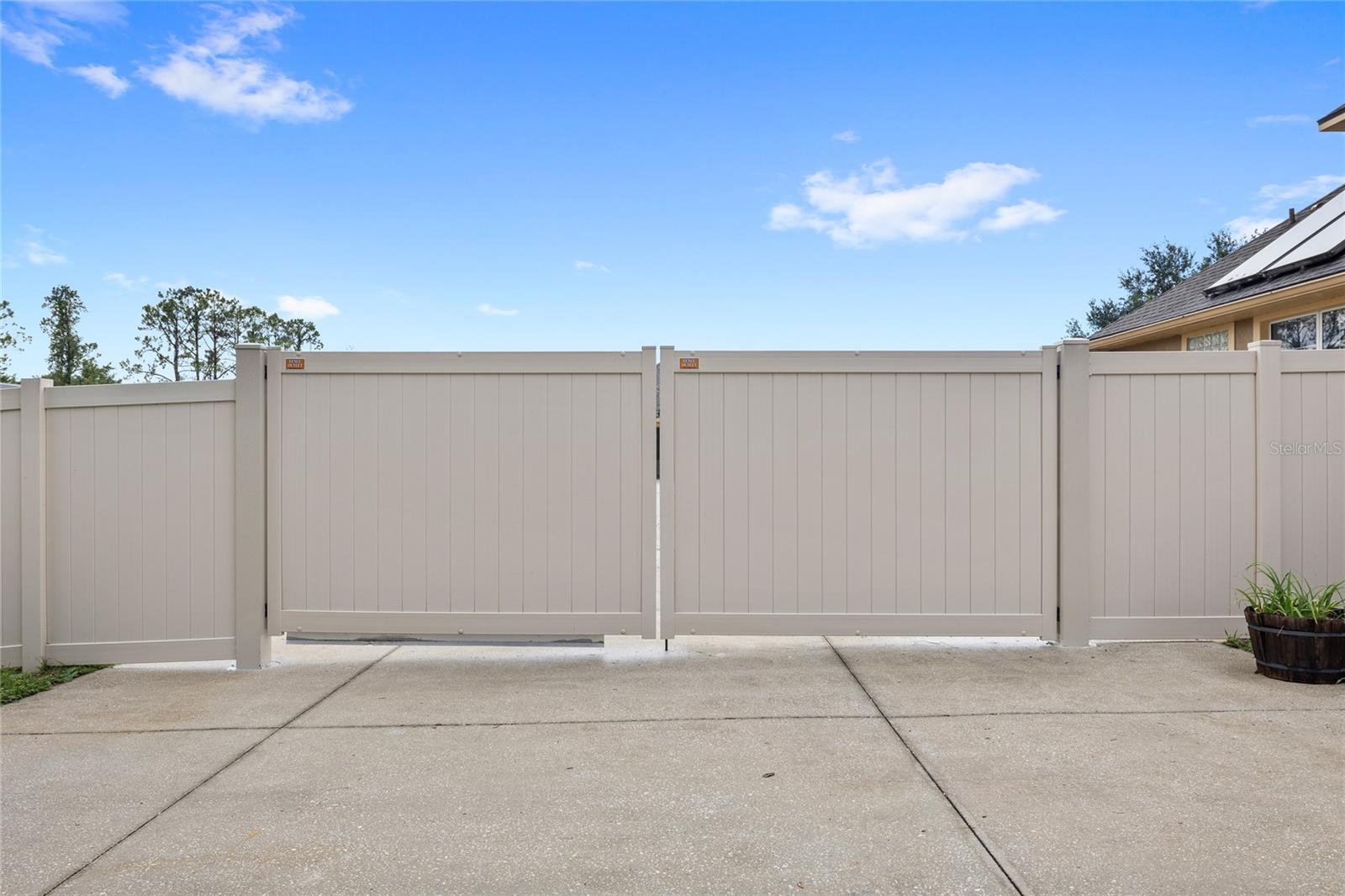 double door fence to backyard