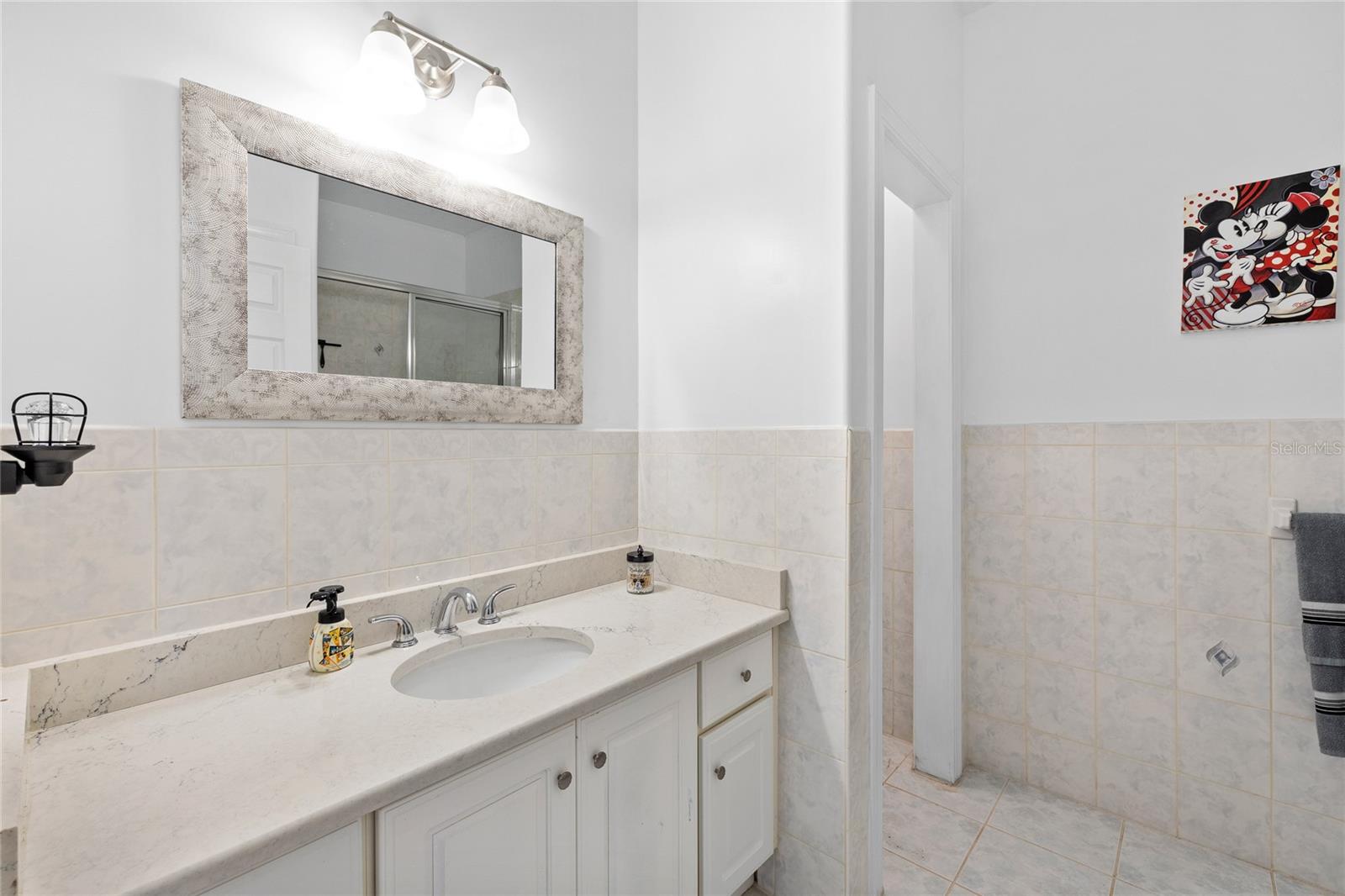 full bathroom number four in upstairs hallway serving bedrooms four and five