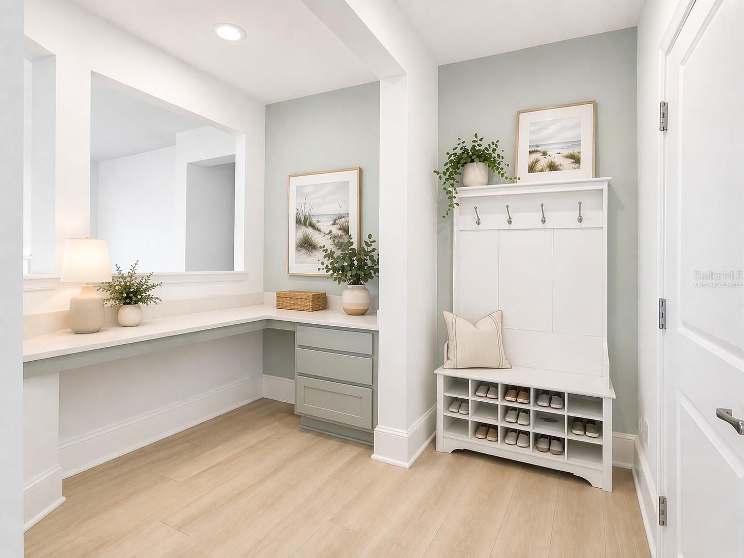 14048 Larkspur Lake Dr - Virtually staged. Versatile drop zone featuring a built-in workspace for everyday organization.