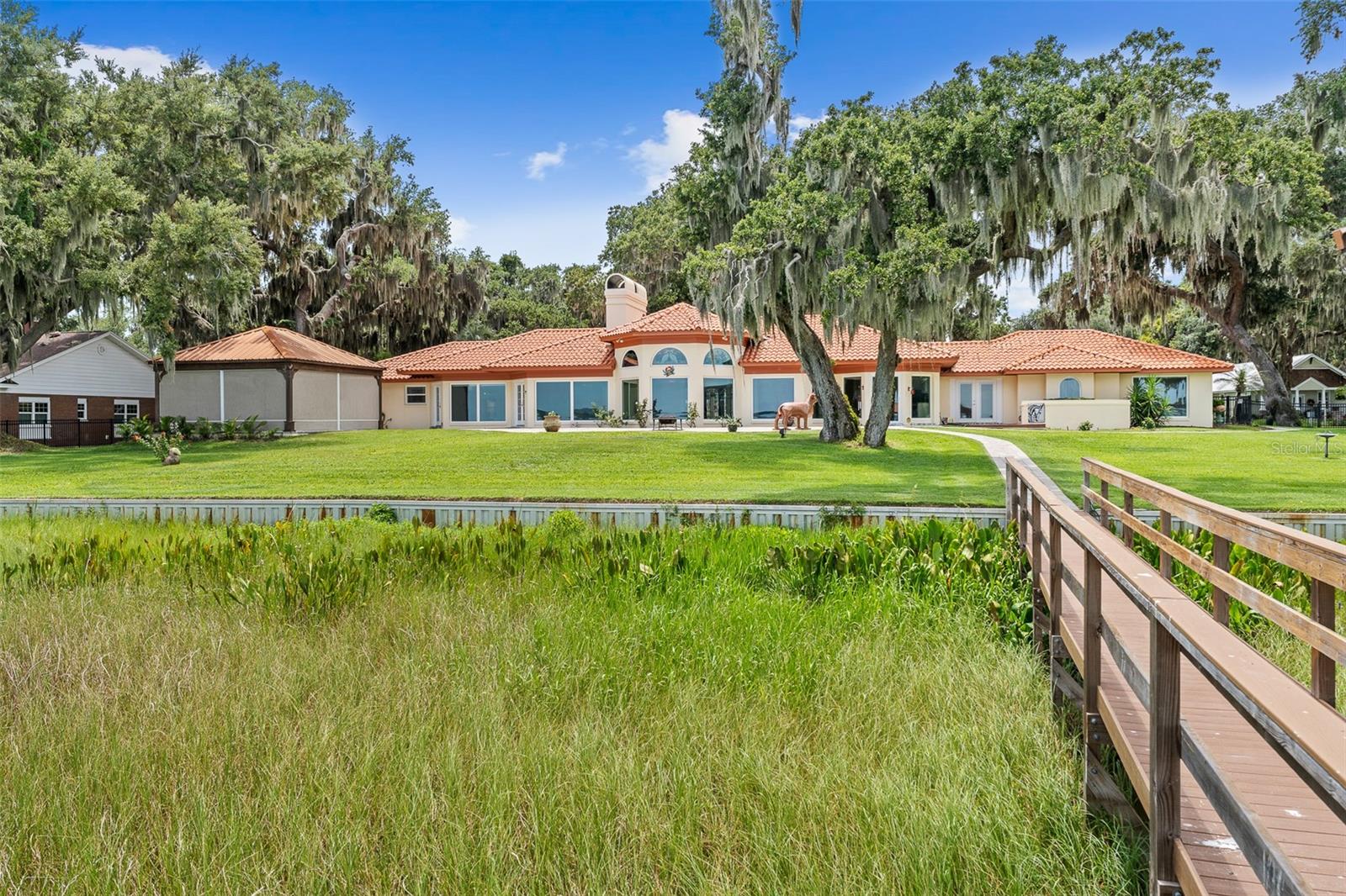 1412 MOSSWOOD DR, Leesburg, FL 34748