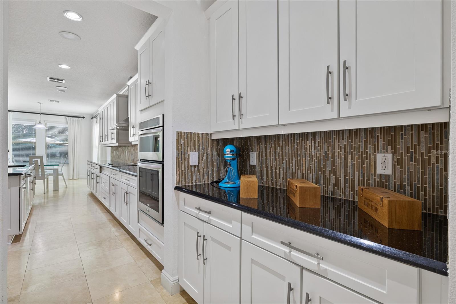 Travertine floor, Granite countertop