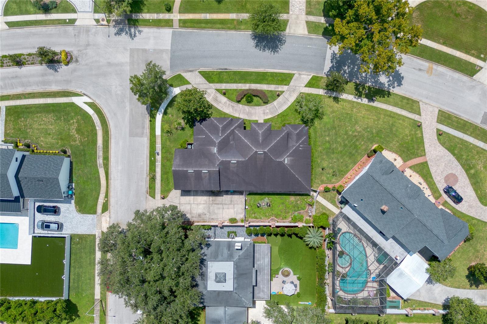 Corner lot with circular driveway.