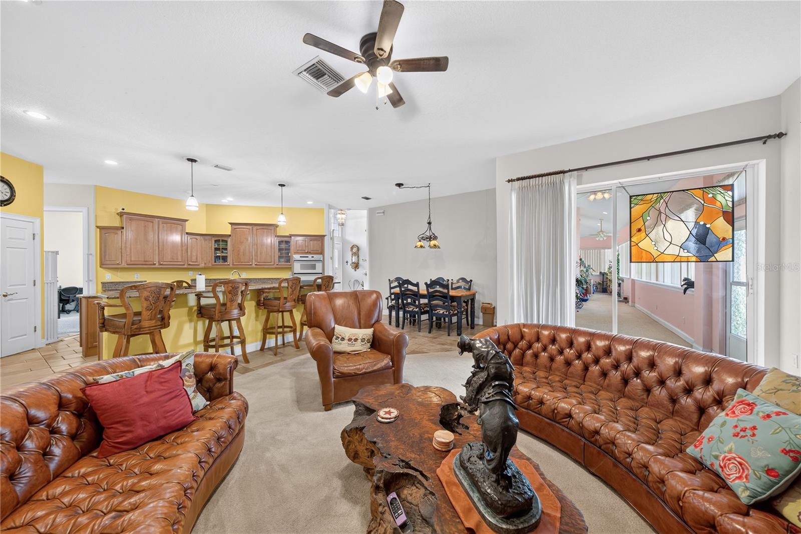Kitchen has bar seating and ample room for casual dining.