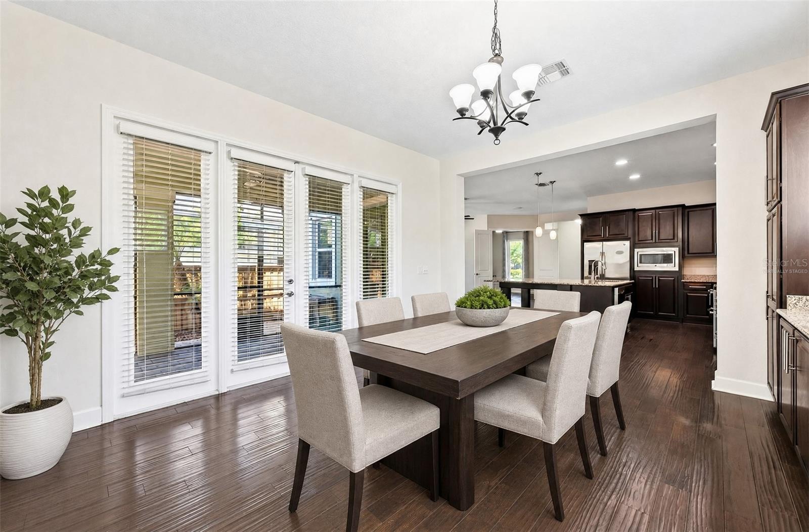 Light filled formal dining. Virtually Staged.
