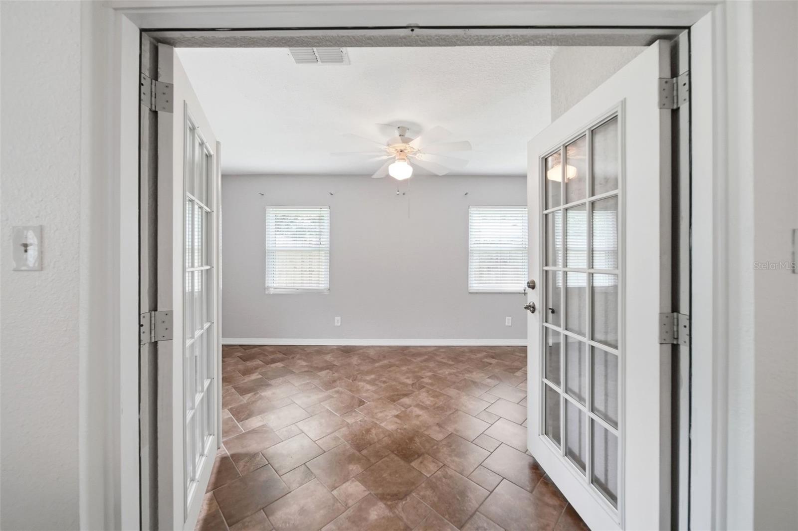 Enclosed patio | bedroom space | bonus room | flex space | home office