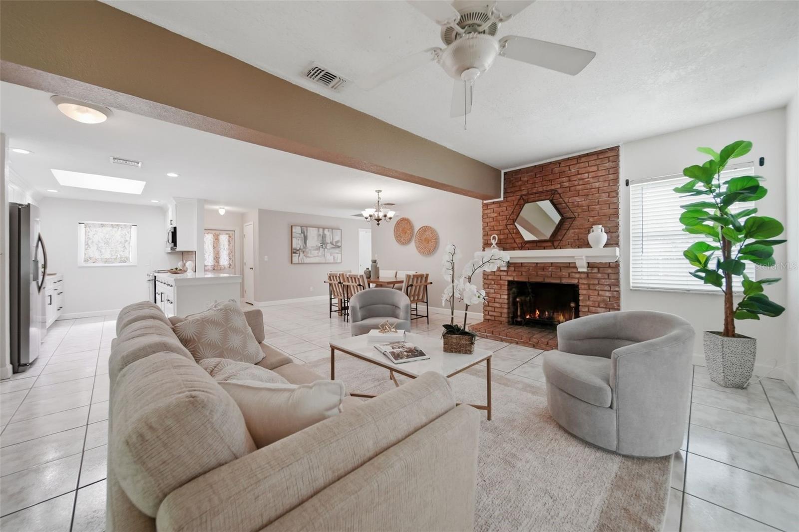 Living room space with fireplace.