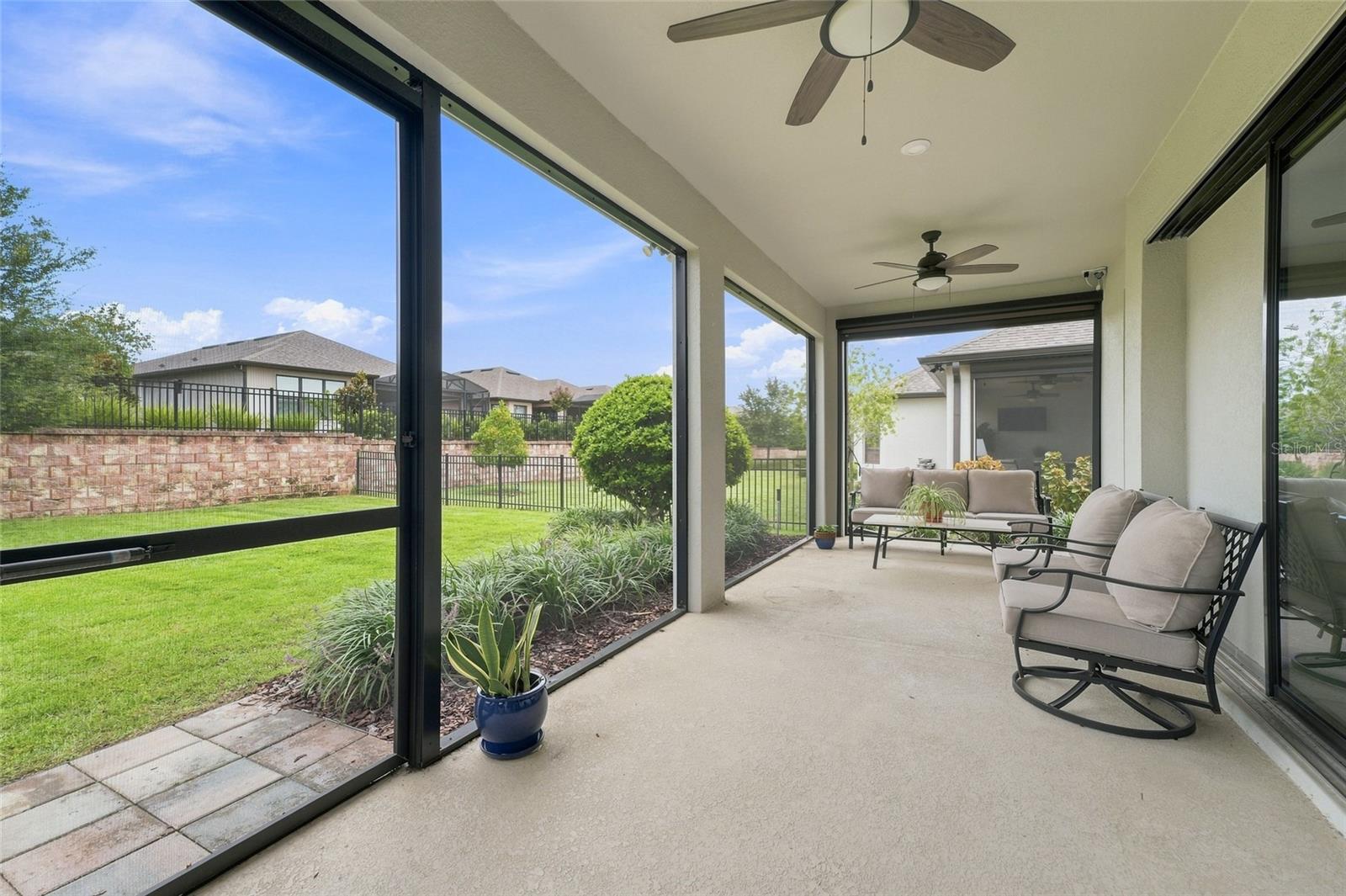 Expansive lanai to include motorized sun panels for added privacy & entertaining