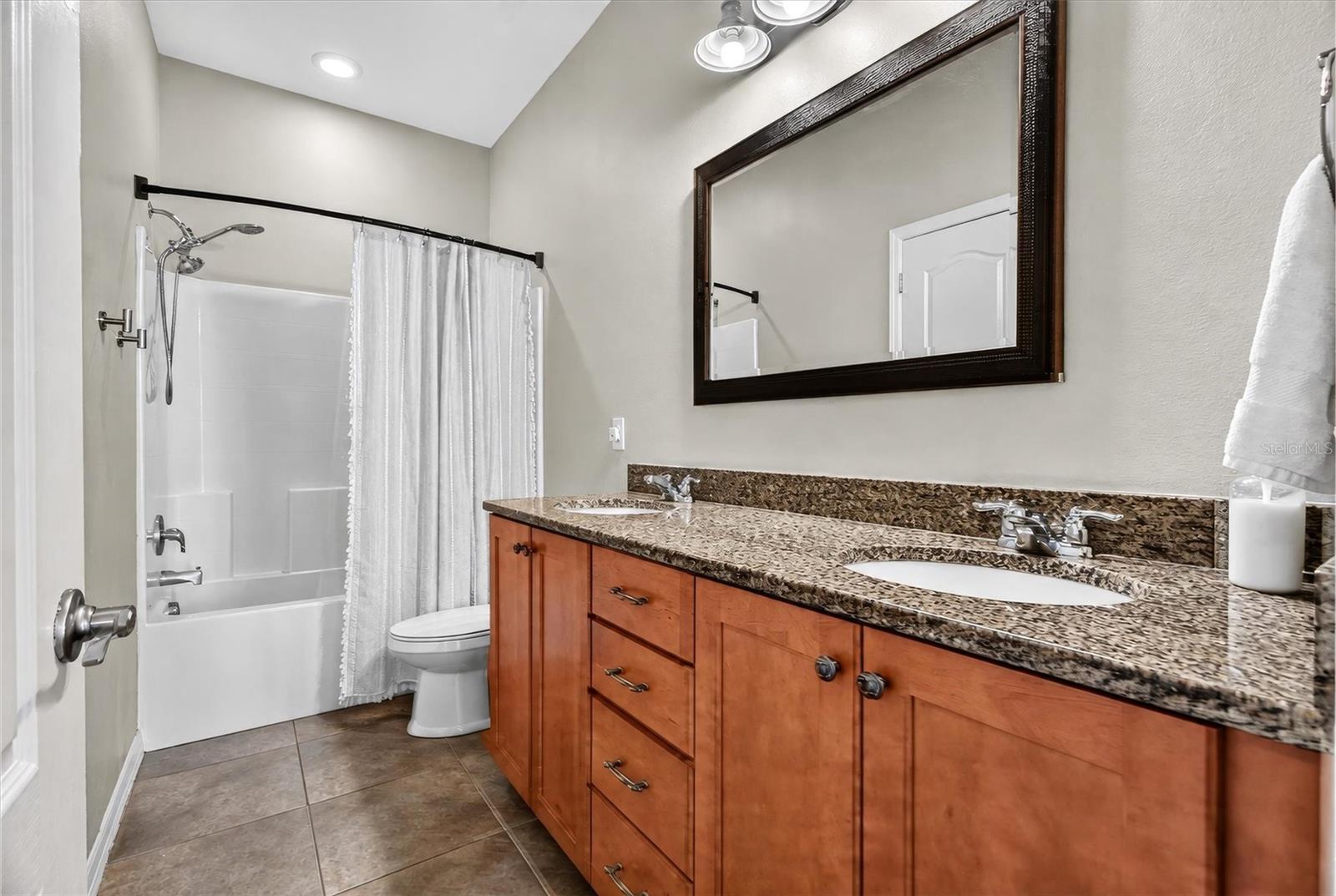 SECONDARY BATH NEXT TO THE POOL