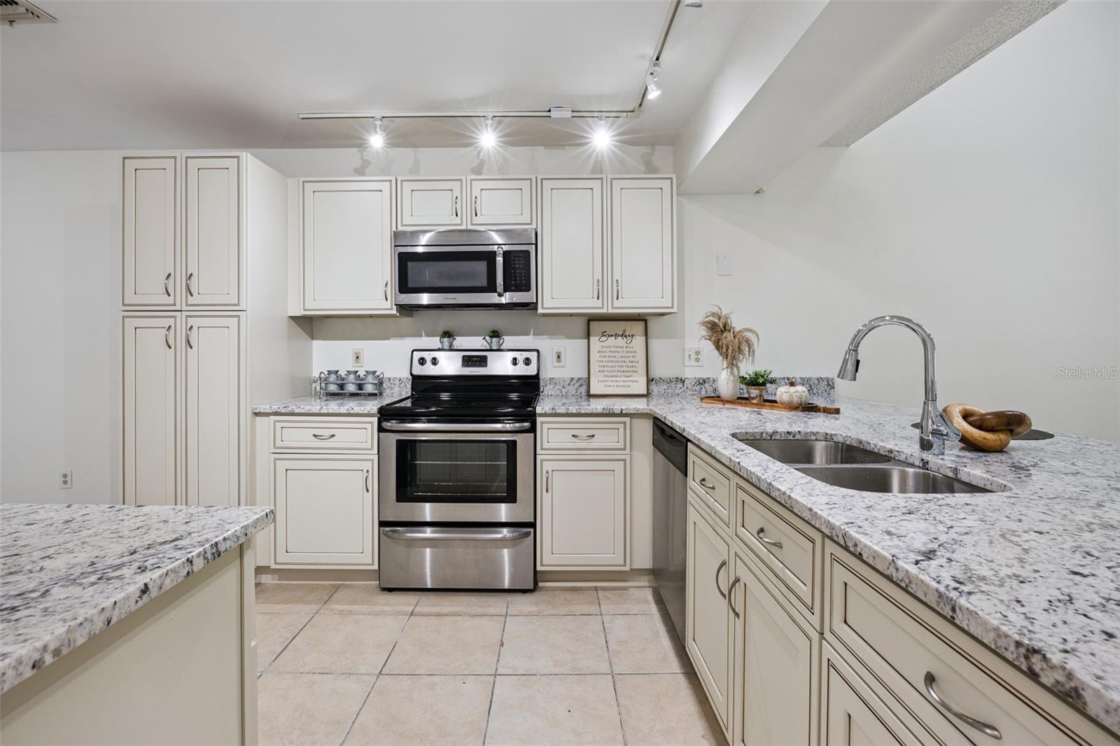 Newly Renovated Kitchen with granite countertops and cabinets