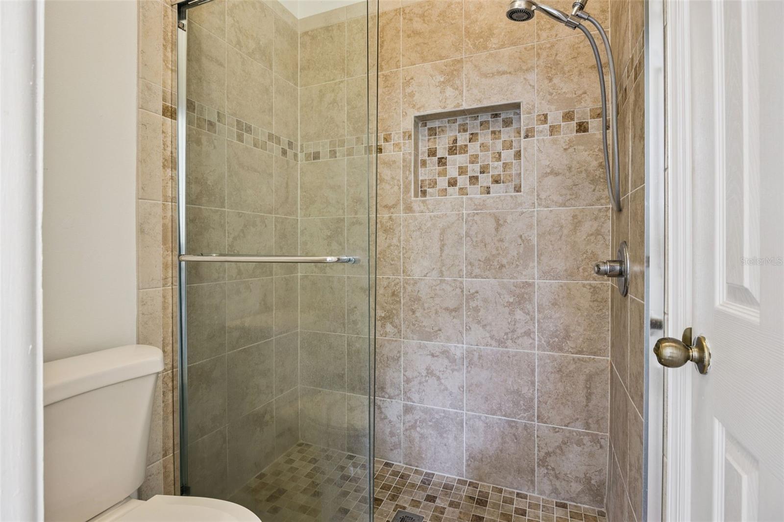 Upstairs shower with dual access