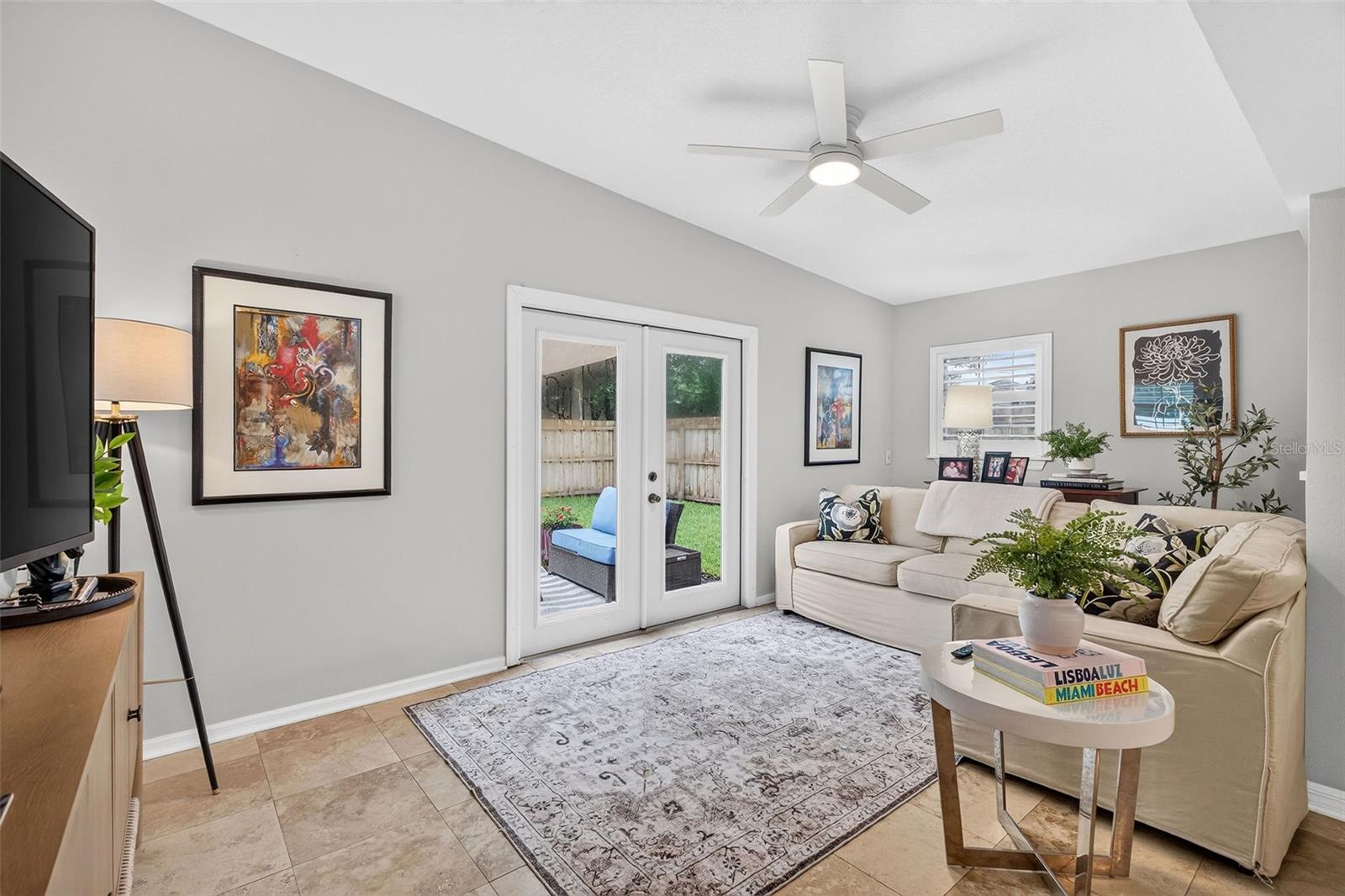 Living room opens to backyard