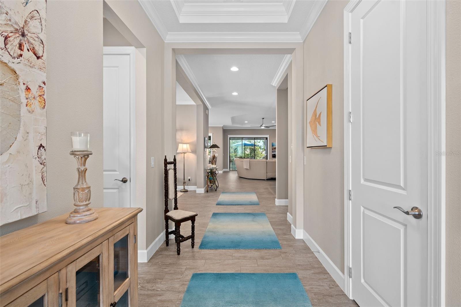 Upon entry you will be greeted by a see through floor plan offering 10' ceilings with tray's and crown molding. Upon entry you will be greeted by a see through floor plan offering 10' ceilings with tray's and crown molding.