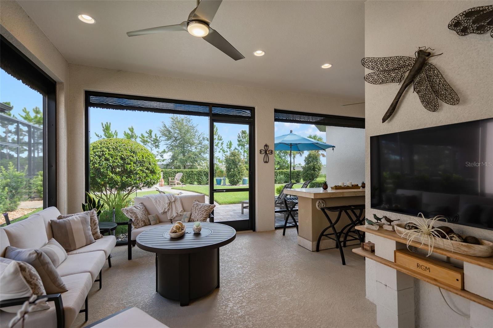 The screened lanai also has Power Roll Down Shades. Wait until you see what is around the corner.
