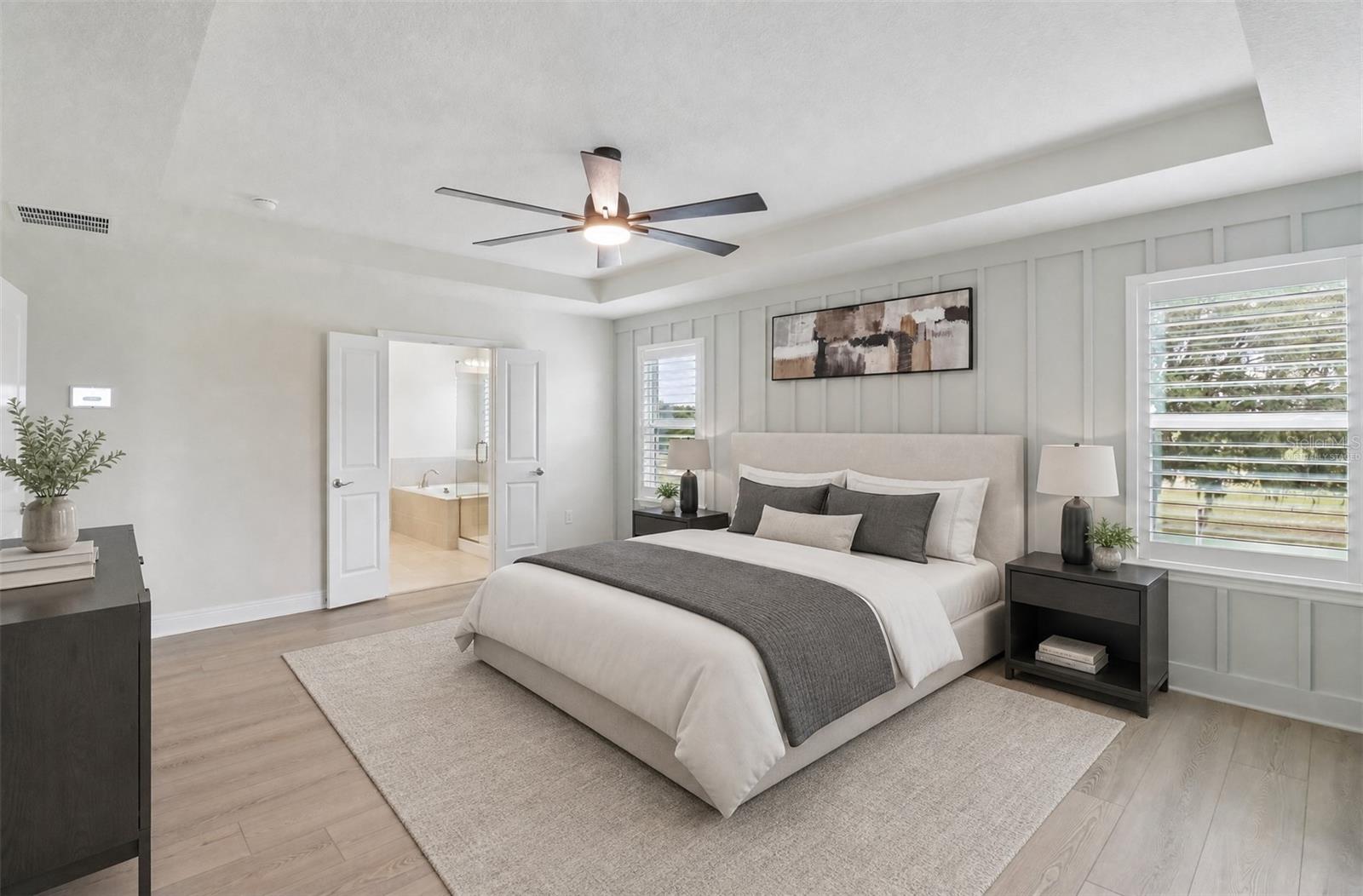 Light, bright and elevated - welcome to your primary suite! Virtually Staged.