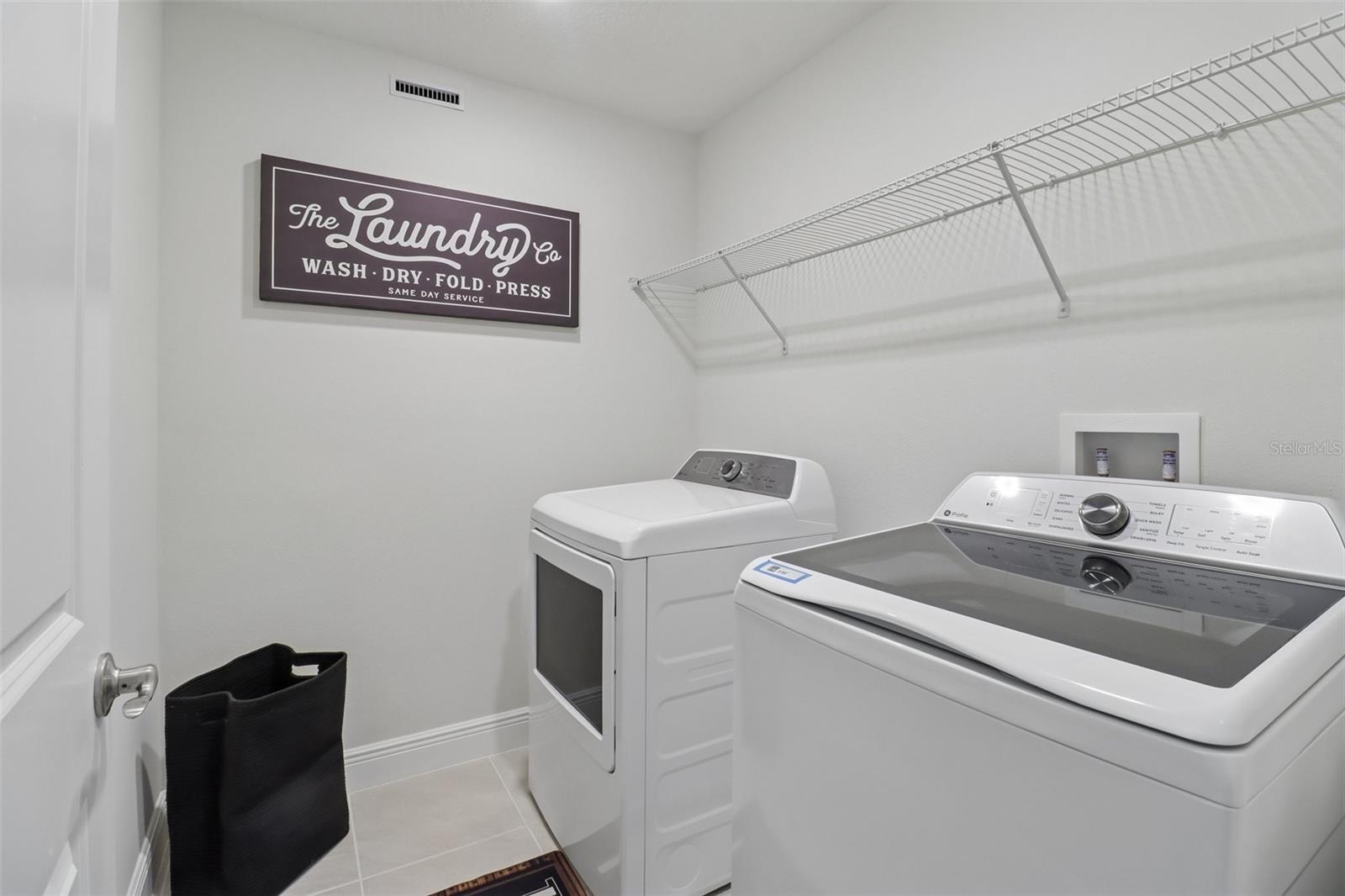 Convenient second floor laundry room.