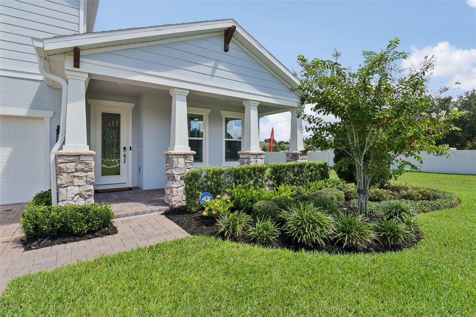 Manicured front entry, covered front porch. Manicured front entry, covered front porch.