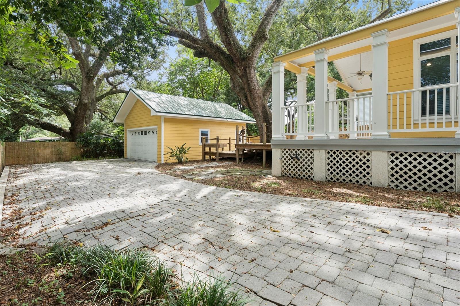 Paver driveway, 2 - car garage.