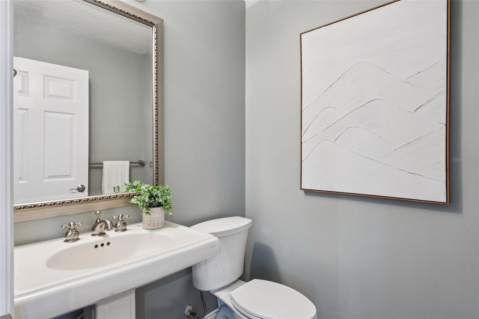 Convenient half bath.