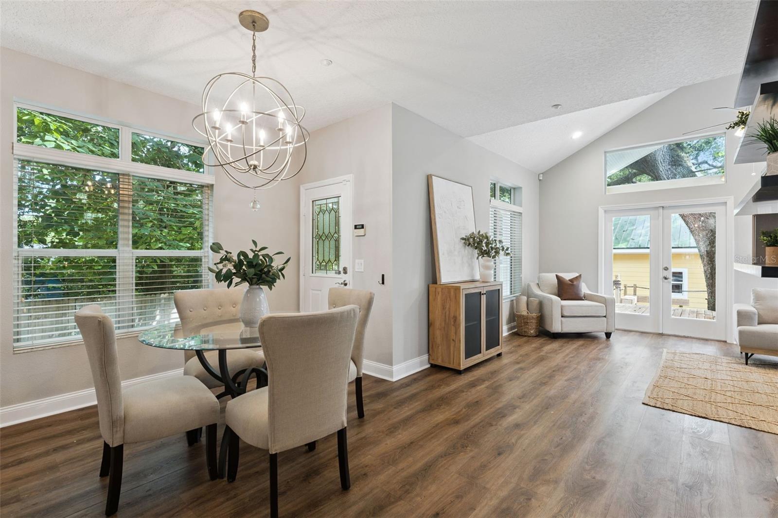 Seamless flow from living, to dining, to kitchen.