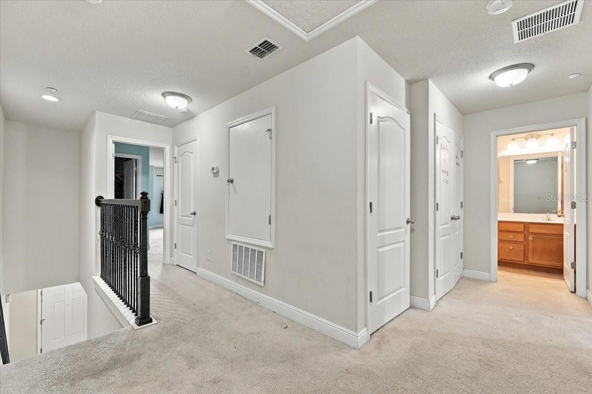 Upper-level hallway providing convenient access to the bedrooms.
