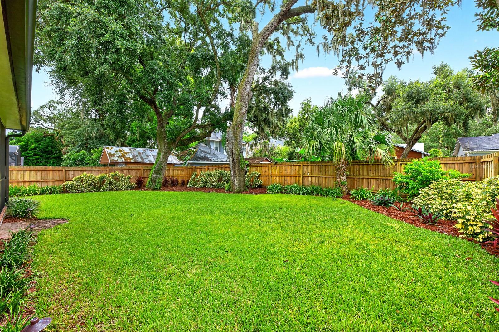 .21 acre lot, fenced backyard.