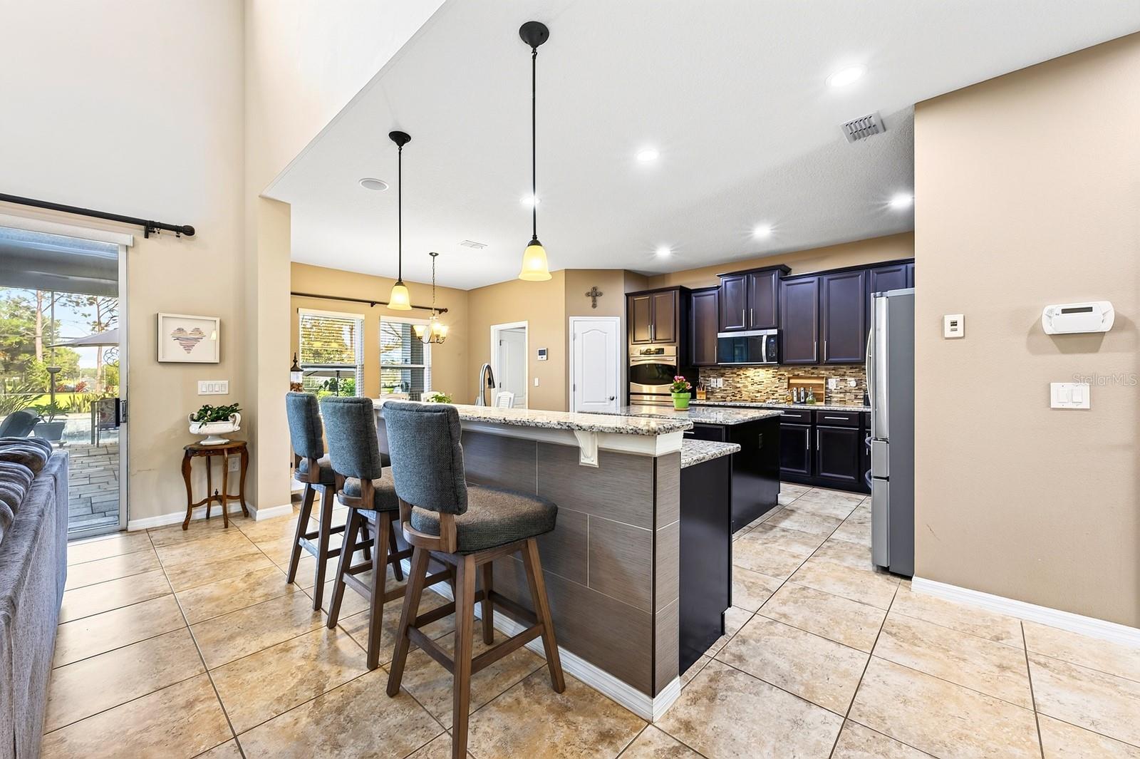 The kitchen truly is the heart of this beautiful home, gather with family or entertain friends.