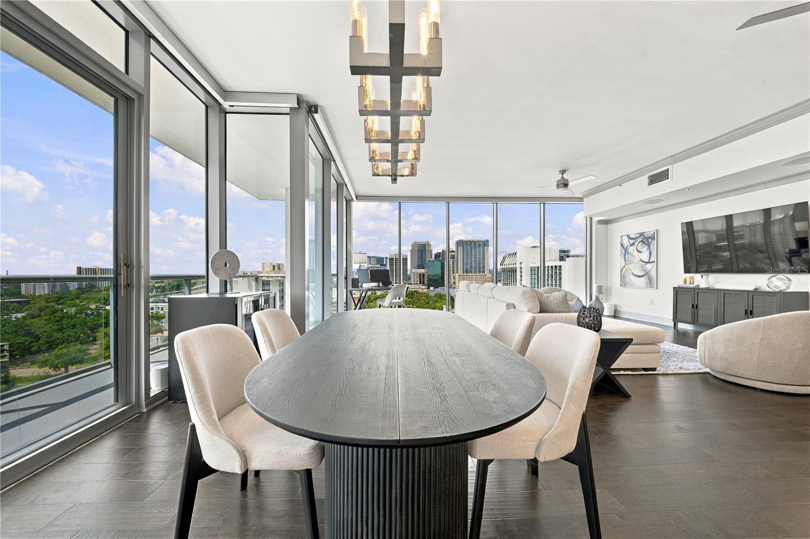 Corner Layout | A wide sightline connects the kitchen, dining and living areas