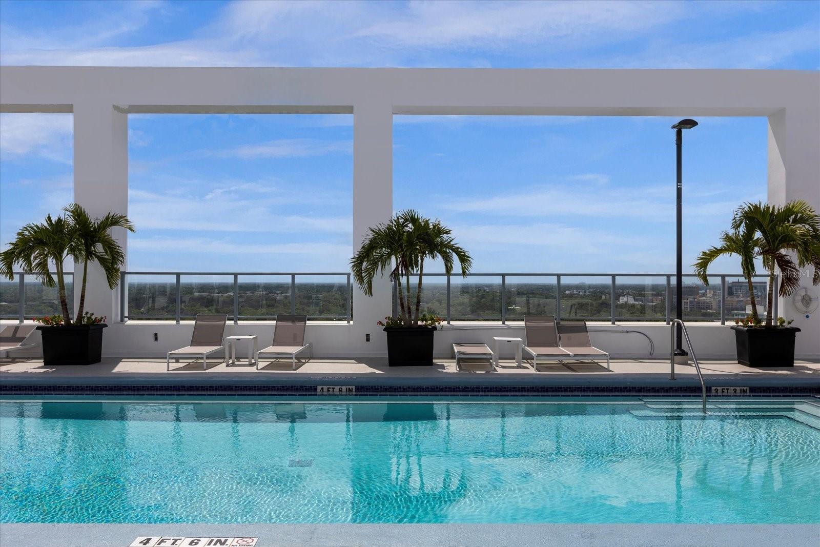 Top of building, pool facing south