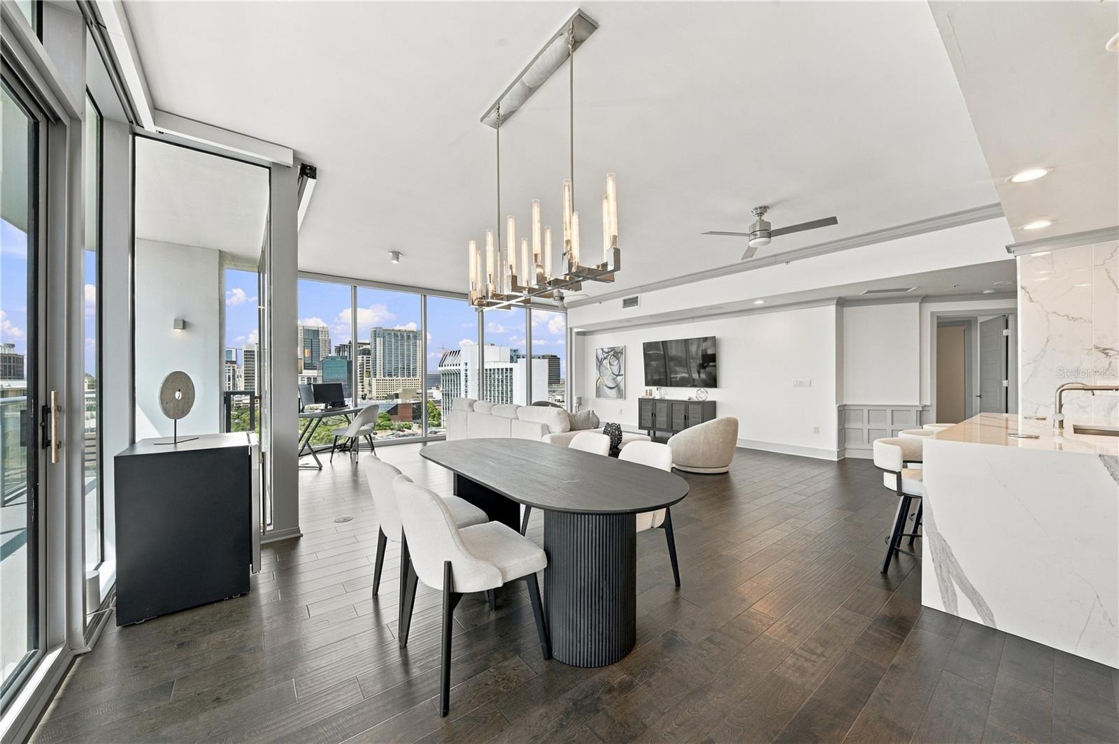 Dining has panoramic city views for entertaining guests.