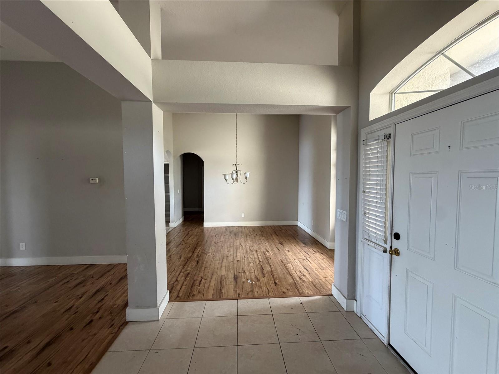 Entry Foyer + Dining Room Entry Foyer + Dining Room