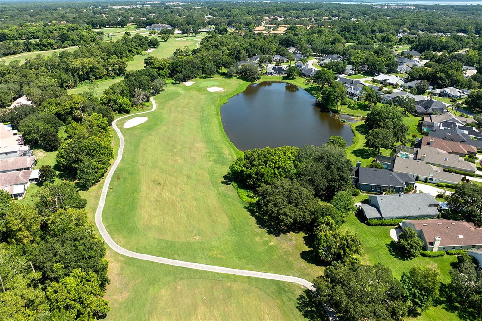 Adjacent to Tuscawilla Country Club