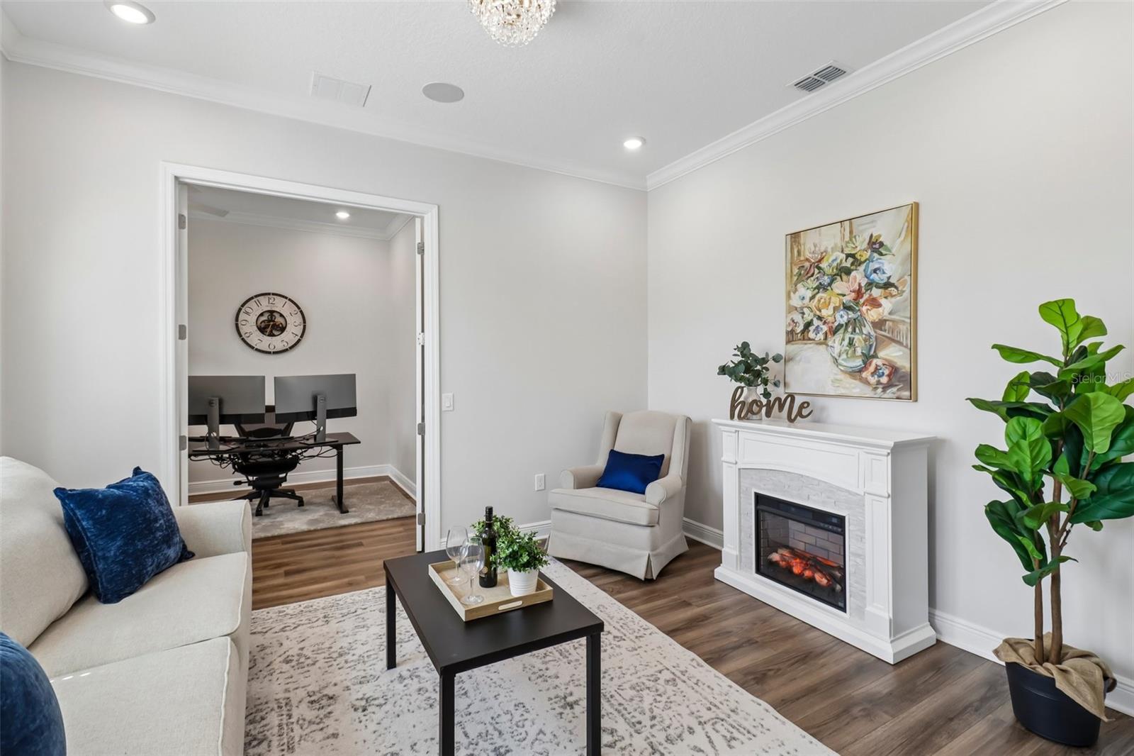 Formal living room with a fireplace