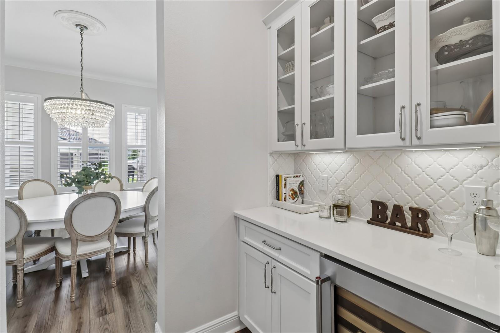 Butler's pantry in between the kitchen & dining room