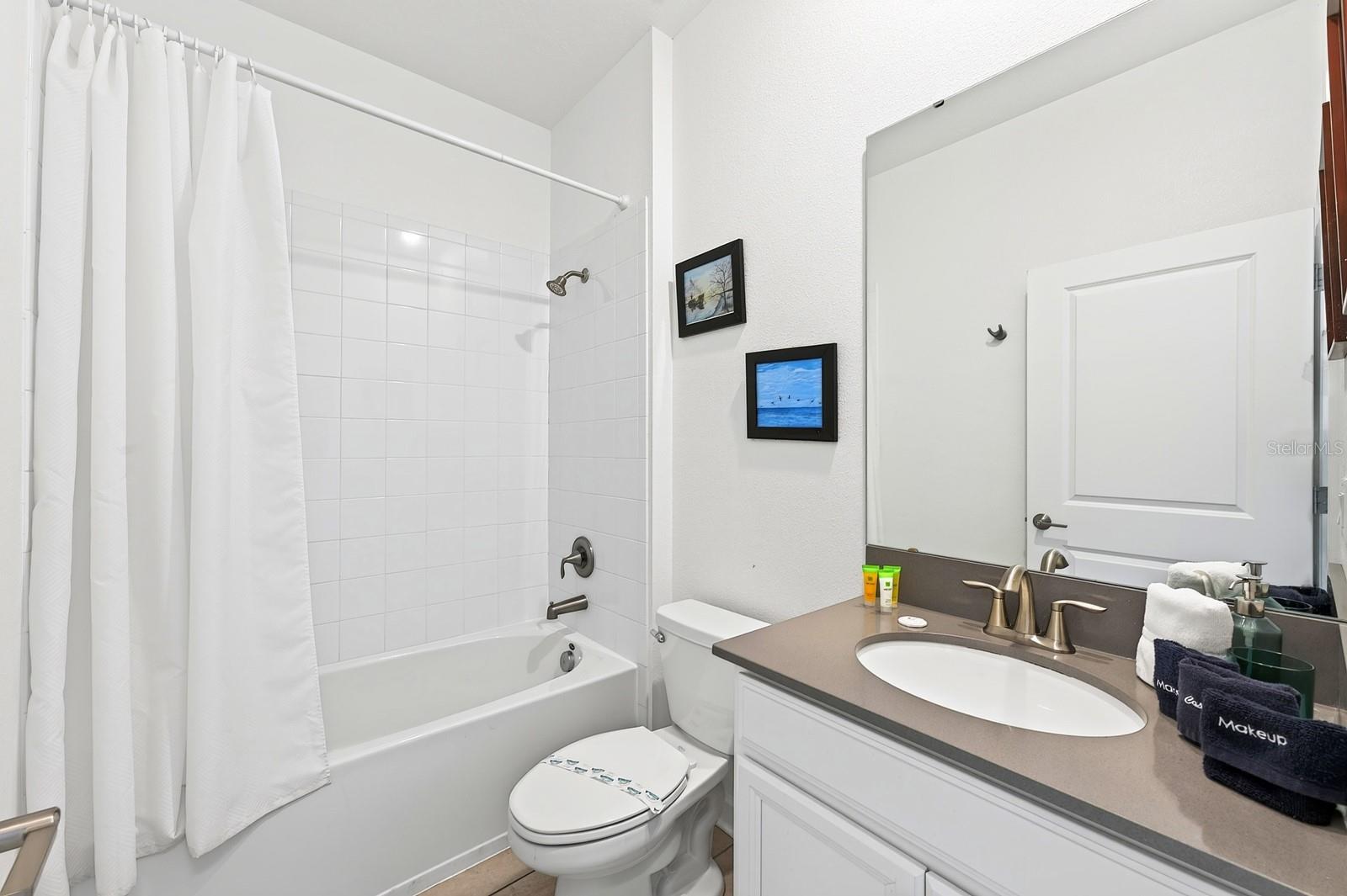 The main floor also offers a BEDROOM and FULL BATH, providing an ideal option for guests, extended family or MULTIGENERATIONAL LIVING.