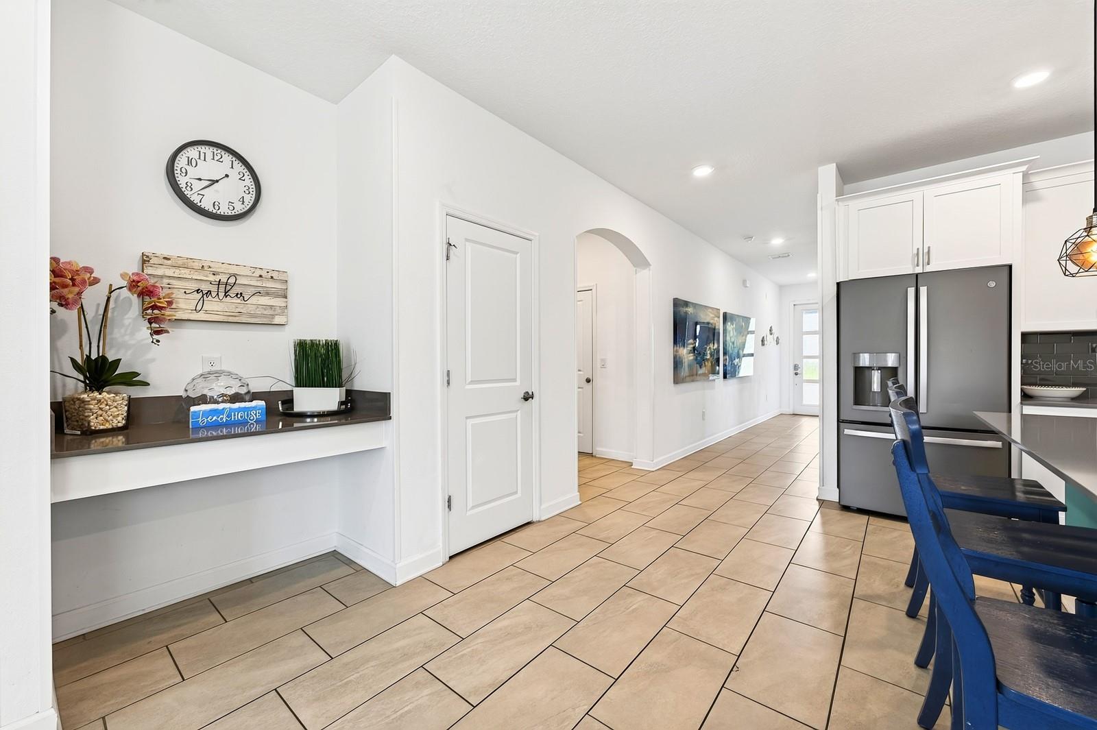 From the moment you enter, the CERAMIC TILE FLOORING and modern finishes create a fresh, inviting feel.