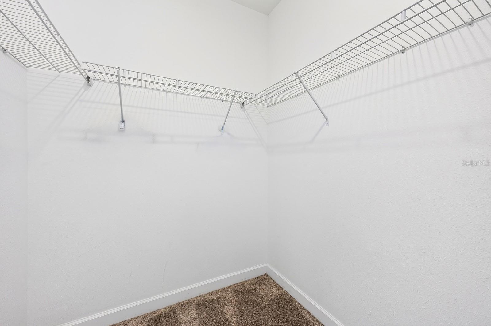 The Primary walk-in closet